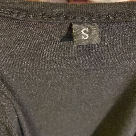 Small black shortsleeve dress with cut outs and knots at stomach waist level​ - Picture 8 of 8